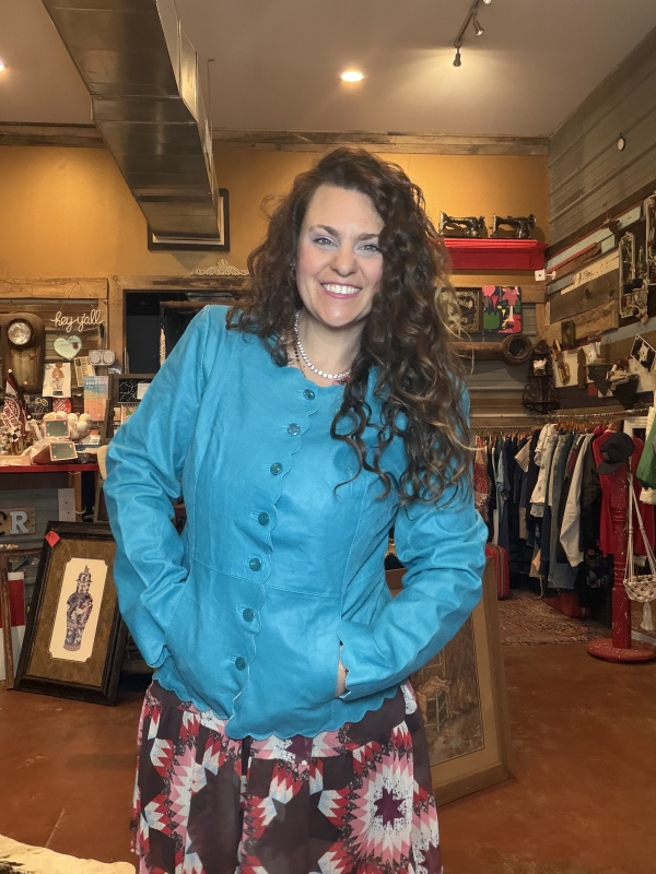 Turquoise leather jacket with scalloped trim