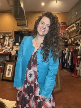 Turquoise leather jacket with scalloped trim