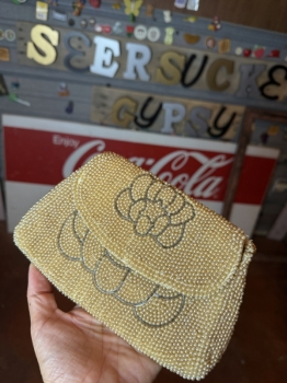 Handmade pearl clutch with star pattern 