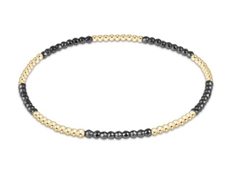 Blissful Faceted Hematite 2mm Gold Bead Bracelet