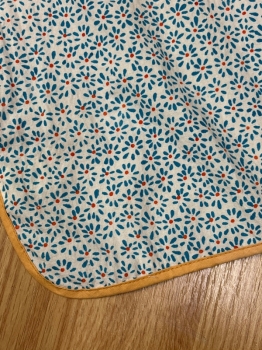 Orange and Blue Flower Bib